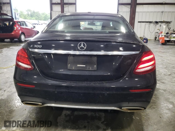 2017 Mercedes-Benz E 300 Luxury with VIN WDDZF4JB0HA039244, listed as a Copart auction lot 56474805 with 135,674 mi miles and Salvage title. Bid and sale history available at DreamBid. Image 6.