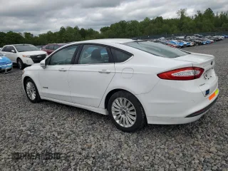 2015 Ford Fusion SE Hybrid с VIN 3FA6P0LU2FR120126, выставлен на аукционе Copart как лот 57130185 с пробегом 55 792 миль миль и Чистый • Clean title. История ставок и продаж доступна на DreamBid. Изображение 2.