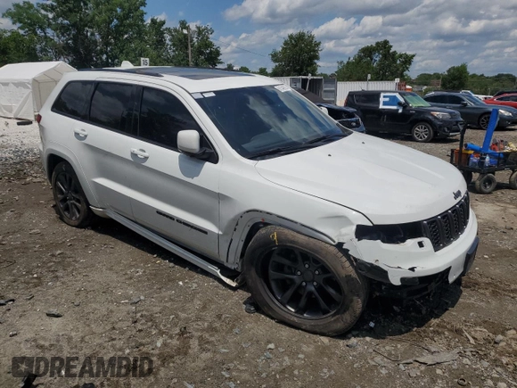 2018 Jeep Grand Cherokee High Altitude with VIN 1C4RJFCG5JC179040, listed as a Copart auction lot 61540625 with 135,310 mi miles and Salvage title. Bid and sale history available at DreamBid. Image 4.