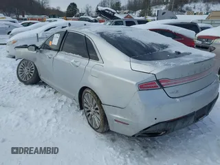 2014 Lincoln MKZ z VIN 3LN6L2J92ER832064, wystawiony jako IAAI lot #41374046 z przebiegiem 84 000 mil mil oraz . Historia ofert i sprzedaży dostępna na DreamBid. Obrazek 3.