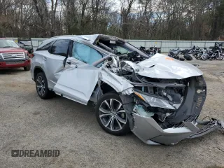 2018 Lexus RX with VIN JTJDGKCA8J2003809, listed as a Copart auction lot 87351074 with Not Provided miles and Salvage Title. Bid and sale history available at carsss.com. Image 4.