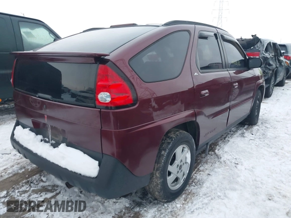 2002 Pontiac Aztek z VIN 3G7DA03E72S599401, wystawiony jako IAAI lot #41248586 z przebiegiem 135 971 mil mil oraz . Historia ofert i sprzedaży dostępna na DreamBid. Obrazek 4.