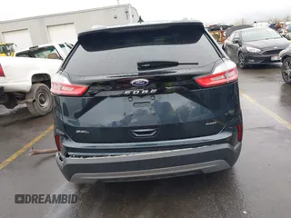 2022 Ford Edge SEL z VIN 2FMPK4J90NBA71360, wystawiony jako IAAI lot #41724316 z przebiegiem 35 309 mil mil oraz . Historia ofert i sprzedaży dostępna na DreamBid. Obrazek 17.