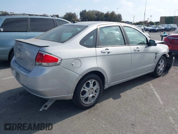 2008 Ford Focus SE with VIN 1FAHP35N98W243888, listed as a IAAI auction lot 42370178 with 141,269 mi miles and . Bid and sale history available at DreamBid. Image 4.