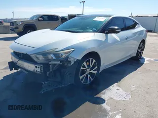 2016 Nissan Maxima SV z VIN 1N4AA6AP8GC436917, wystawiony jako IAAI lot #41691025 z przebiegiem 140 149 mil mil oraz . Historia ofert i sprzedaży dostępna na DreamBid. Obrazek 2.