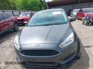 2018 Ford Focus SE with VIN 1FADP3F20JL312395, listed as a IAAI auction lot 42110335 with 110,720 mi miles and . Bid and sale history available at DreamBid. Image 12.