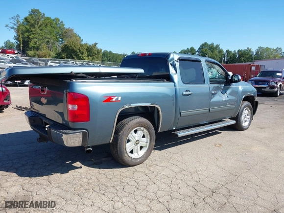 2010 Chevrolet Silverado 1500 LT with VIN 3GCRCSE09AG151287, listed as a IAAI auction lot 40532023 with 154,535 mi miles. Bid and sale history available at carsss.com. Image 4.