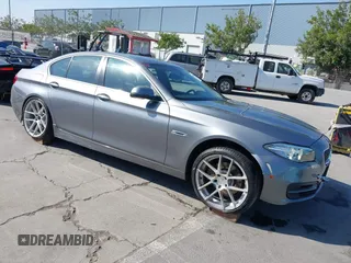 2014 BMW 5 Series 528i z VIN WBA5A5C57ED511306, wystawiony jako IAAI lot #42206023 z przebiegiem 96 933 mil mil oraz . Historia ofert i sprzedaży dostępna na DreamBid. Obrazek 1.