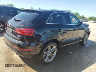 2015 Audi Q3 Prestige with VIN WA1GFCFS0FR010792, listed as a Copart auction lot 54068064 with 121,415 mi miles and Salvage title. Bid and sale history available at DreamBid. Image 3.