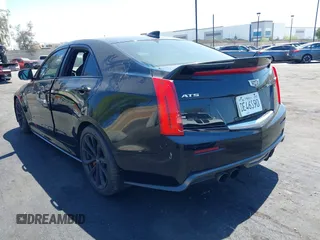 2016 Cadillac ATS-V with VIN 1G6AN5SY1G0106427, listed as a IAAI auction lot 42020517 with 59,279 mi miles. Bid and sale history available at carsss.com. Image 3.