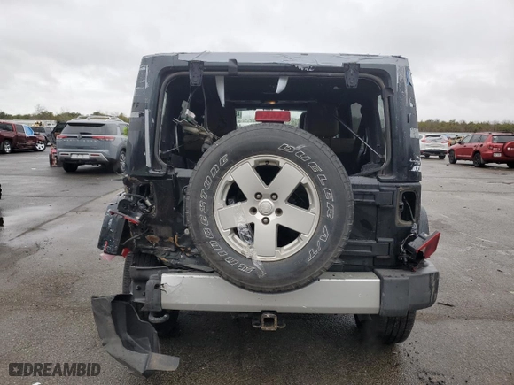 2012 Jeep Wrangler Unlimited Sahara with VIN 1C4HJWEG0CL163310, listed as a Copart auction lot 48972825 with 125,934 mi miles and Salvage Title. Bid and sale history available at carsss.com. Image 6.