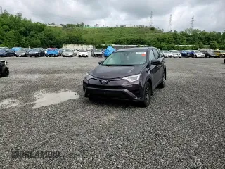 2018 Toyota RAV4 LE with VIN 2T3BFREV5JW721315, listed as a Copart auction lot 59016665 with 136,490 mi miles and Salvage title. Bid and sale history available at DreamBid. Image 14.