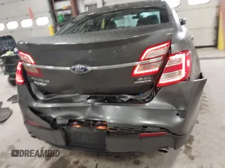 2015 Ford Taurus SEL with VIN 1FAHP2E87FG207029, listed as a IAAI auction lot 41752890 with 119,858 mi miles and . Bid and sale history available at carsss.com. Image 16.