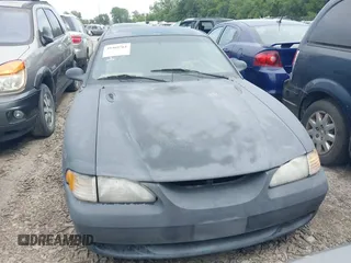 1997 Ford Mustang with VIN 1FALP4043VF158166, listed as a IAAI auction lot 39369761 with 124,992 mi miles. Bid and sale history available at carsss.com. Image 6.
