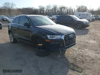 2016 Audi Q3 Premium Plus with VIN WA1EFCFS4GR000291, listed as a IAAI auction lot 41092020 with 94,573 mi miles. Bid and sale history available at carsss.com. Image 1.