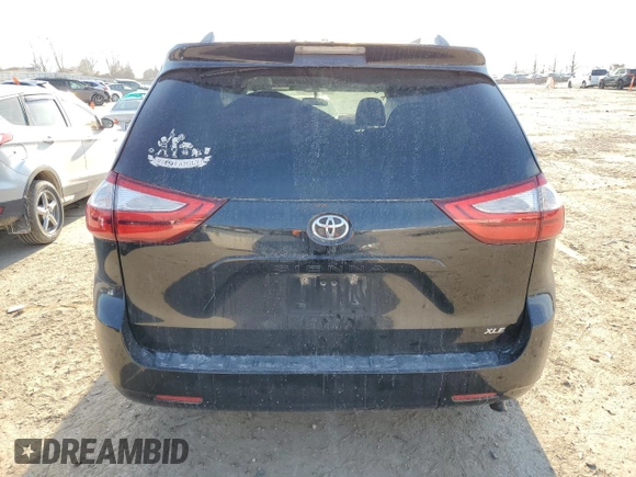 2015 Toyota Sienna XLE с VIN 5TDYK3DC2FS573488, выставлен на аукционе Copart как лот 44770774 с пробегом 158 502 миль миль и Списание • Salvage title. История ставок и продаж доступна на DreamBid. Изображение 6.