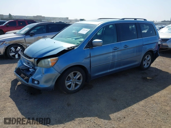 2010 Honda Odyssey Touring with VIN 5FNRL3H92AB056186, listed as a IAAI auction lot 41851386 with 199,109 mi miles. Bid and sale history available at carsss.com. Image 17.