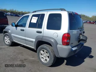 2004 Jeep Liberty Sport with VIN 1J4GL48K84W130852, listed as a IAAI auction lot 42130444 with 99,188 mi miles. Bid and sale history available at carsss.com. Image 3.