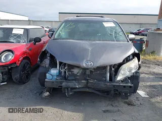 2015 Toyota Sienna XLE with VIN 5TDYK3DC6FS660410, listed as a IAAI auction lot 41801496 with 81,755 mi miles. Bid and sale history available at carsss.com. Image 13.