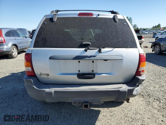 2004 Jeep Grand Cherokee Laredo with VIN 1J4GW48S54C103651, listed as a Copart auction lot 62972615 with 188,000 mi miles and Clean title. Bid and sale history available at DreamBid. Image 6.