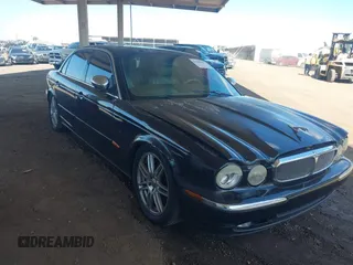 2005 Jaguar XJ Vanden Plas z VIN SAJWA82C05SG47589, wystawiony jako IAAI lot #42409697 z przebiegiem 222 598 mil mil oraz . Historia ofert i sprzedaży dostępna na DreamBid. Obrazek 1.