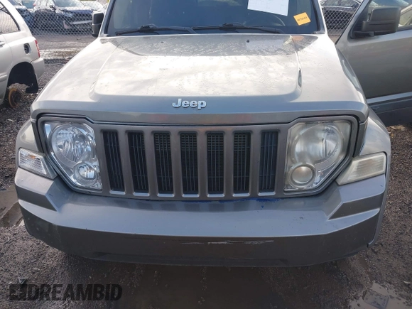 2012 Jeep Liberty Sport with VIN 1C4PJMAK1CW198611, listed as a IAAI auction lot 42187221 with 118,623 mi miles. Bid and sale history available at carsss.com. Image 6.