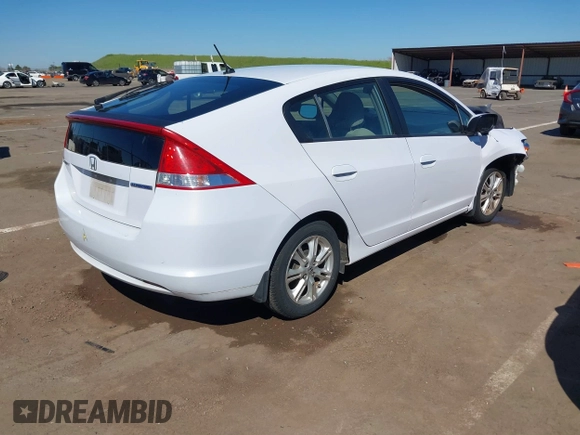 2010 Honda Insight EX with VIN JHMZE2H79AS039292, listed as a IAAI auction lot 41880303 with Not Provided miles and . Bid and sale history available at DreamBid. Image 4.