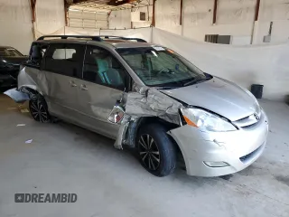 2010 Toyota Sienna XLE with VIN 5TDYK4CCXAS323450, listed as a Copart auction lot 62491545 with 220,121 mi miles and Salvage title. Bid and sale history available at DreamBid. Image 4.