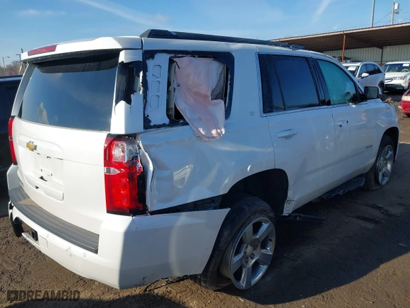 2020 Chevrolet Tahoe LT with VIN 1GNSKBKC1LR290889, listed as a IAAI auction lot 41492821 with 107,843 mi miles. Bid and sale history available at carsss.com. Image 4.