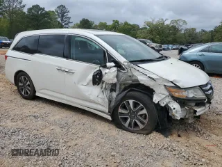 2016 Honda Odyssey Touring Elite with VIN 5FNRL5H91GB075591, listed as a Copart auction lot 51652045 with 126,965 mi miles and Salvage Title. Bid and sale history available at carsss.com. Image 4.