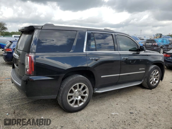 2015 GMC Yukon Denali with VIN 1GKS1CKJ0FR140877, listed as a Copart auction lot 50917985 with 180,726 mi miles and Salvage Title. Bid and sale history available at carsss.com. Image 3.