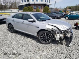 2018 Ford Taurus SEL with VIN 1FAHP2E87JG137928, listed as a Copart auction lot 53438695 with 56,874 mi miles and Salvage title. Bid and sale history available at DreamBid. Image 4.