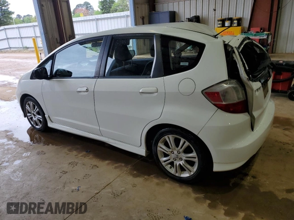 2009 Honda Fit Sport with VIN JHMGE88419S026712, listed as a Copart auction lot 51165865 with 54,586 mi miles and Salvage Title. Bid and sale history available at carsss.com. Image 2.