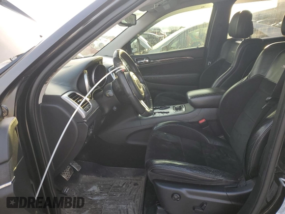 2012 Jeep Grand Cherokee SRT8 with VIN 1C4RJFDJ2CC265421, listed as a Copart auction lot 48654325 with 115,514 mi miles and Salvage Title. Bid and sale history available at carsss.com. Image 7.