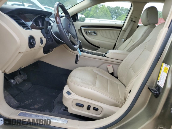2013 Ford Taurus Limited z VIN 1FAHP2F84DG233065, wystawiony jako Copart lot #60356025 z przebiegiem 37 362 mil mil oraz Szkoda całkowita • Salvage title. Historia ofert i sprzedaży dostępna na DreamBid. Obrazek 7.
