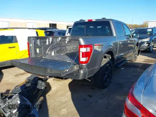 2021 Ford F-150 XL with VIN 1FTFW1ED1MFC62199, listed as a IAAI auction lot 40876641 with 90,504 mi miles. Bid and sale history available at carsss.com. Image 4.