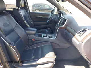 2015 Jeep Grand Cherokee Overland with VIN 1C4RJECG3FC635327, listed as a IAAI auction lot 41910559 with 118,519 mi miles and . Bid and sale history available at DreamBid. Image 5.