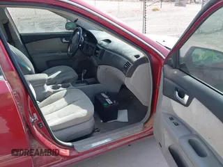 2007 Kia Optima EX with VIN KNAGE124375088526, listed as a IAAI auction lot 41526854 with 285,908 mi miles. Bid and sale history available at carsss.com. Image 5.