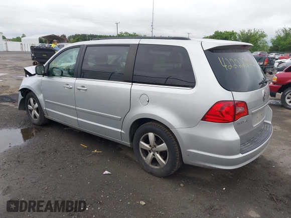 2011 Volkswagen Routan SE z VIN 2V4RW3DGXBR772583, wystawiony jako IAAI lot #42222200 z przebiegiem 213 724 mil mil oraz . Historia ofert i sprzedaży dostępna na DreamBid. Obrazek 3.