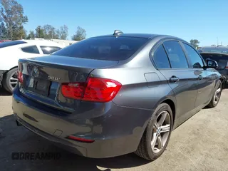 2015 BMW 3 Series 328i with VIN WBA3C1C51FK123852, listed as a IAAI auction lot 41857179 with 90,308 mi miles and . Bid and sale history available at carsss.com. Image 4.