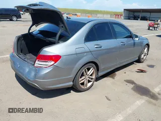 2014 Mercedes-Benz C 250 Sport with VIN WDDGF4HB9EA961665, listed as a IAAI auction lot 42055533 with 112,404 mi miles and . Bid and sale history available at DreamBid. Image 4.