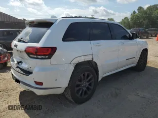 2018 Jeep Grand Cherokee High Altitude with VIN 1C4RJECG1JC260482, listed as a Copart auction lot 57310115 with 144,320 mi miles and Salvage title. Bid and sale history available at DreamBid. Image 3.