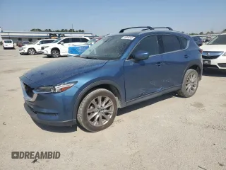 2021 Mazda CX-5 Grand Touring with VIN JM3KFADM0M0391349, listed as a Copart auction lot 48886685 with 38,923 mi miles and Clean Title. Bid and sale history available at carsss.com. Image 1.