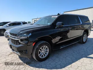 2023 Chevrolet Suburban LS with VIN 1GNSCBKD1PR132161, listed as a Copart auction lot 70649614 with 24,850 mi miles and Salvage Title. Bid and sale history available at DreamBid. Image 1.