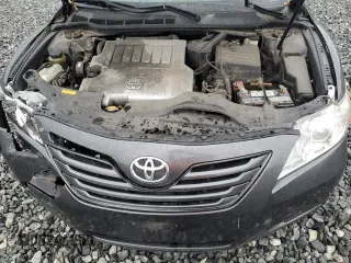 2009 Toyota Camry LE z VIN 4T1BK46K69U091909, wystawiony jako Copart lot #56214505 z przebiegiem 157 133 mil mil oraz Czysty tytuł • Clean title. Historia ofert i sprzedaży dostępna na DreamBid. Obrazek 11.