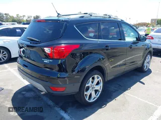 2019 Ford Escape Titanium with VIN 1FMCU9J98KUA21480, listed as a IAAI auction lot 42698275 with 65,478 mi miles and . Bid and sale history available at DreamBid. Image 4.