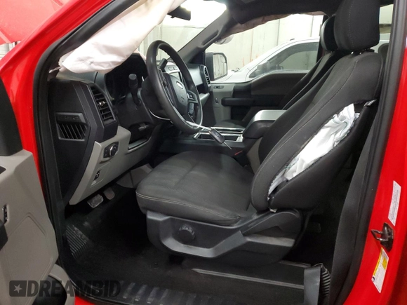 2020 Ford F-150 XL with VIN 1FTEW1E50LKF31657, listed as a Copart auction lot 83083394 with 56,669 mi miles and Salvage title. Bid and sale history available at DreamBid. Image 7.