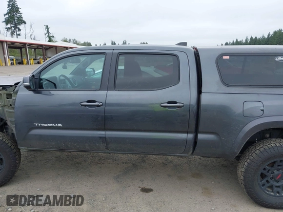 2021 Toyota Tacoma SR5 with VIN 3TMDZ5BN1MM119711, listed as a IAAI auction lot 42479038 with 64,779 mi miles and . Bid and sale history available at DreamBid. Image 15.
