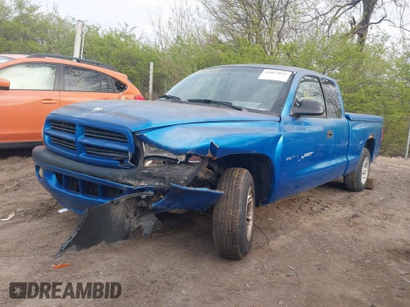 2000 Dodge Dakota with VIN 1B7GL22X8YS774590, listed as a IAAI auction lot 42027035 with 93,092 mi miles and . Bid and sale history available at DreamBid. Image 6.