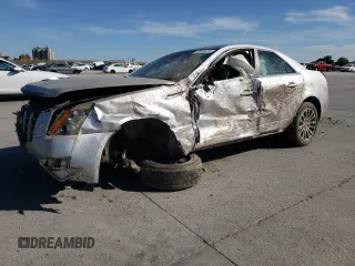 2012 Cadillac CTS Premium with VIN 1G6DS5E34C0147490, listed as a Copart auction lot 79857654 with Not Provided miles and Salvage Title. Bid and sale history available at DreamBid. Image 1.